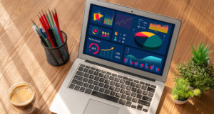 Laptop displaying digital marketing analytics on a desk